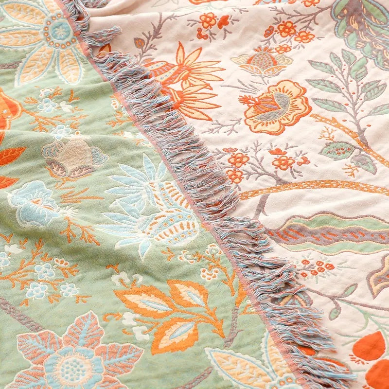 Rustic bohemian floral throw blanket styled in a living room