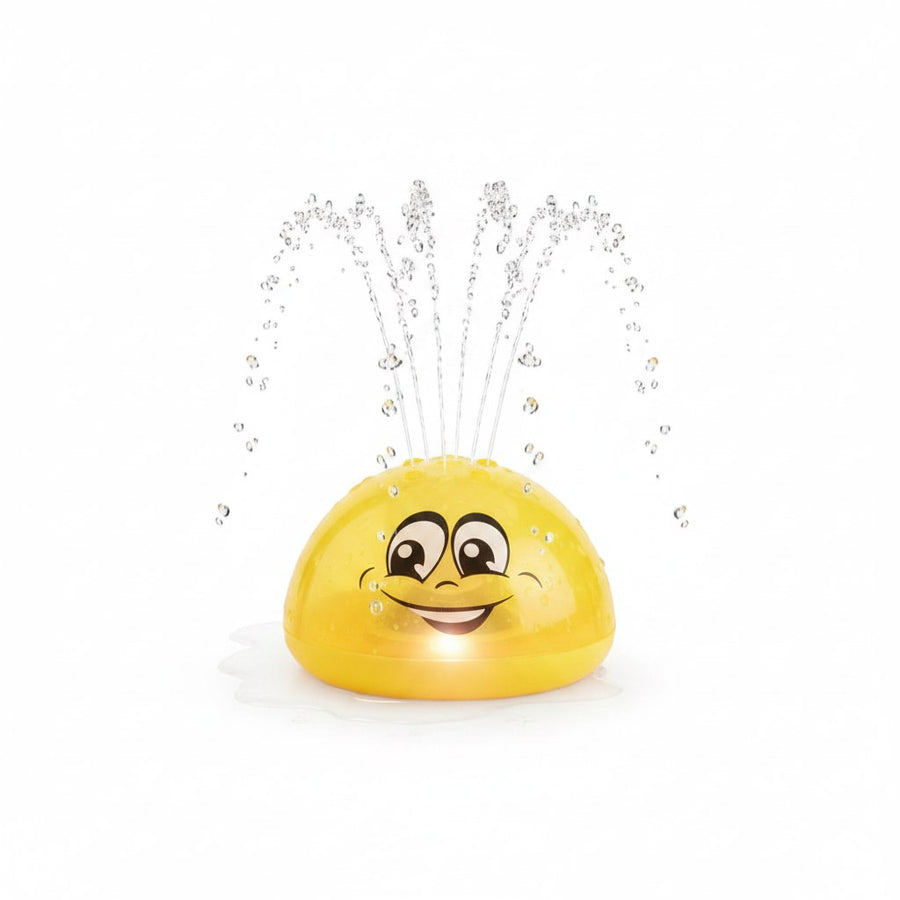 Yellow interactive water toy spraying water on white background