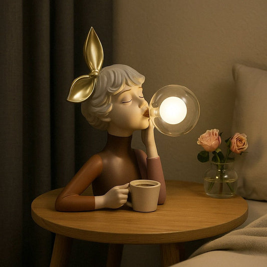 Decorative figurine table lamp with café girl on a bedside table