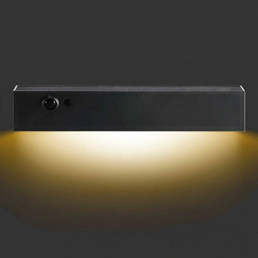Charcoal solar wall light with warm LED glow