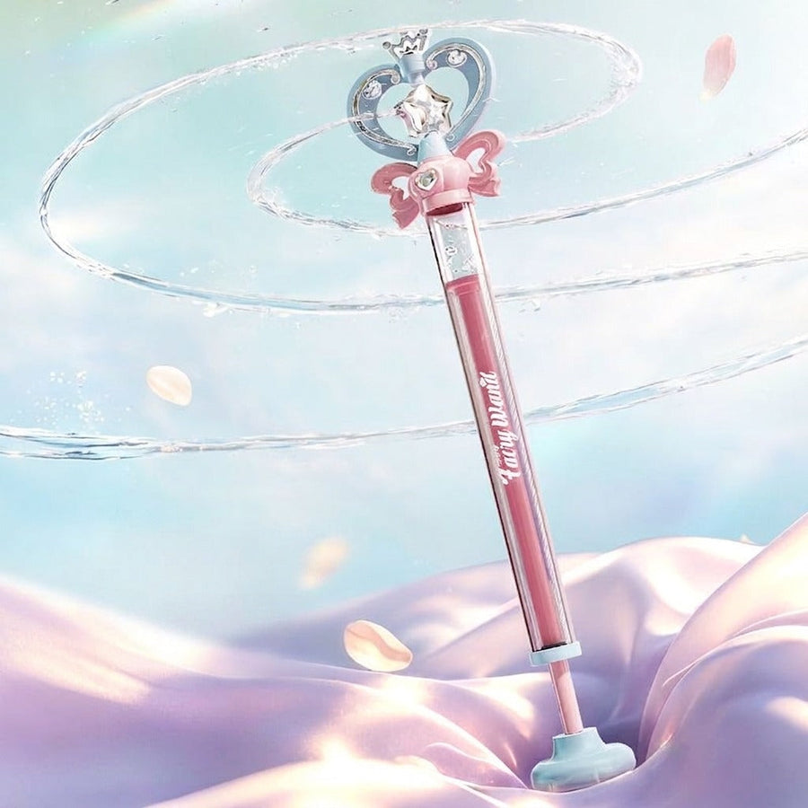 Pink wand-shaped water gun product shot