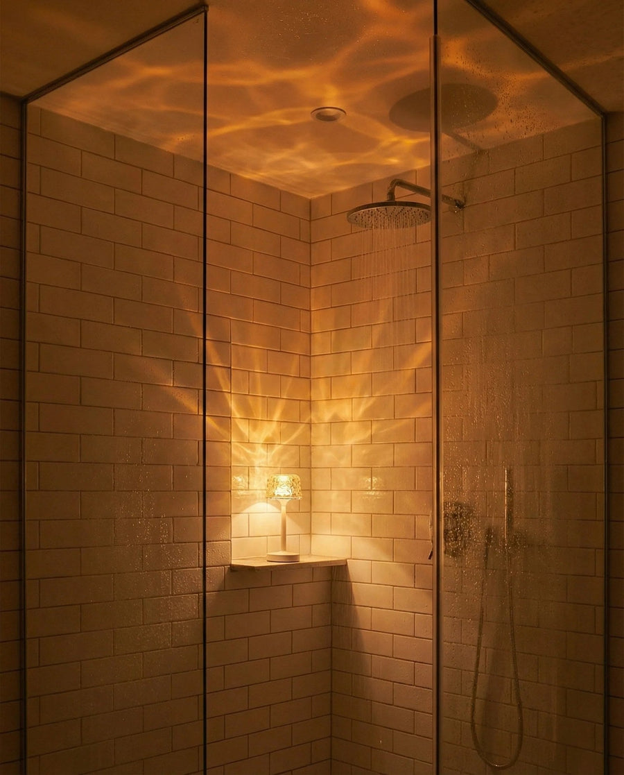 Projection table lamp in a shower setting