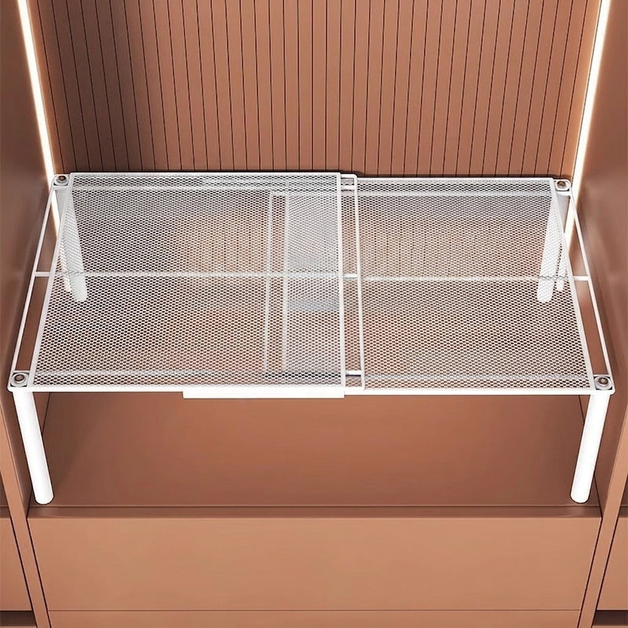 Adjustable closet shelf viewed from above showing the white mesh design
