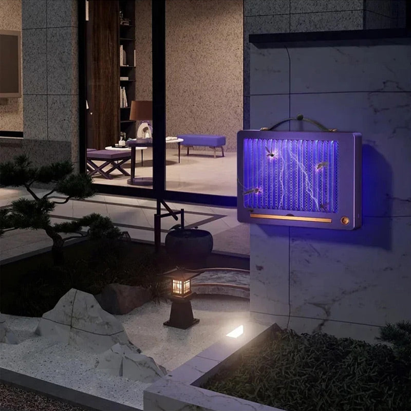 Wall-mounted electric mosquito zapper outdoors with grid active and mosquitoes