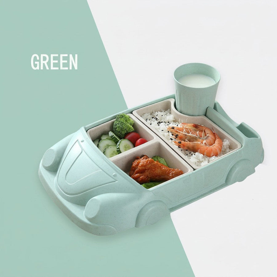 Green car-shaped kids meal set with food in the inserts