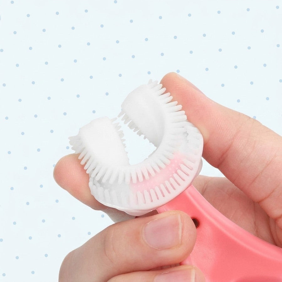 Soft silicone brush head on a 360° kids' toothbrush