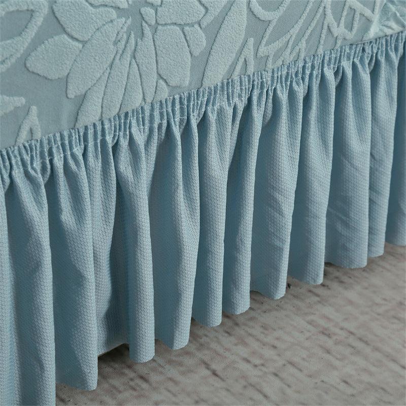 Gathered ruffled skirt drape with elastic waistband visible