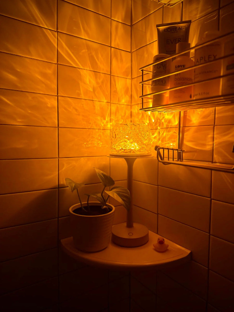 Aurora lamp in a bathroom with plant decor