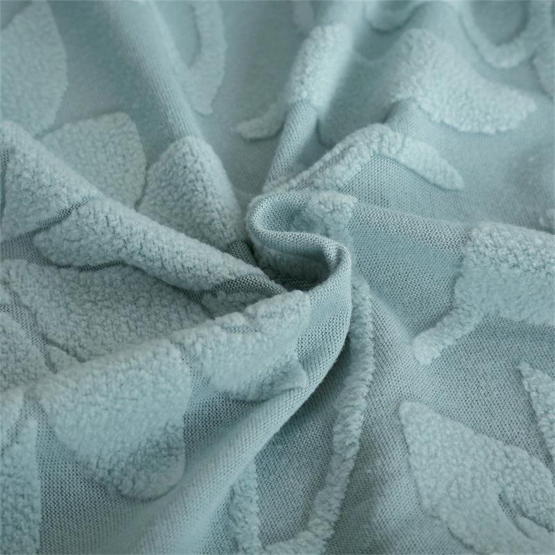Soft jacquard fabric bunched to show texture and material quality