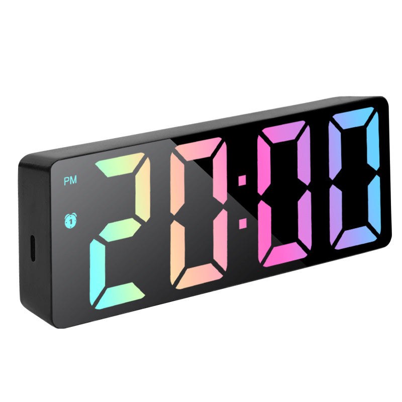 Digital alarm clock with a black case and RGB LED display