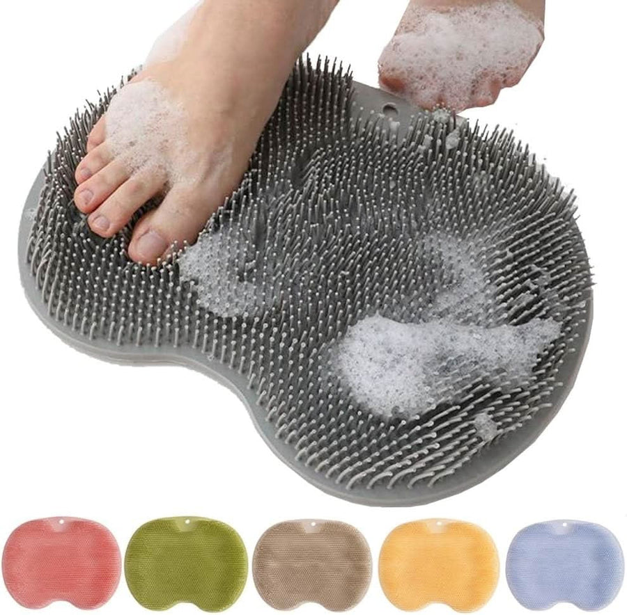 Gray silicone foot scrubber mat with soap suds