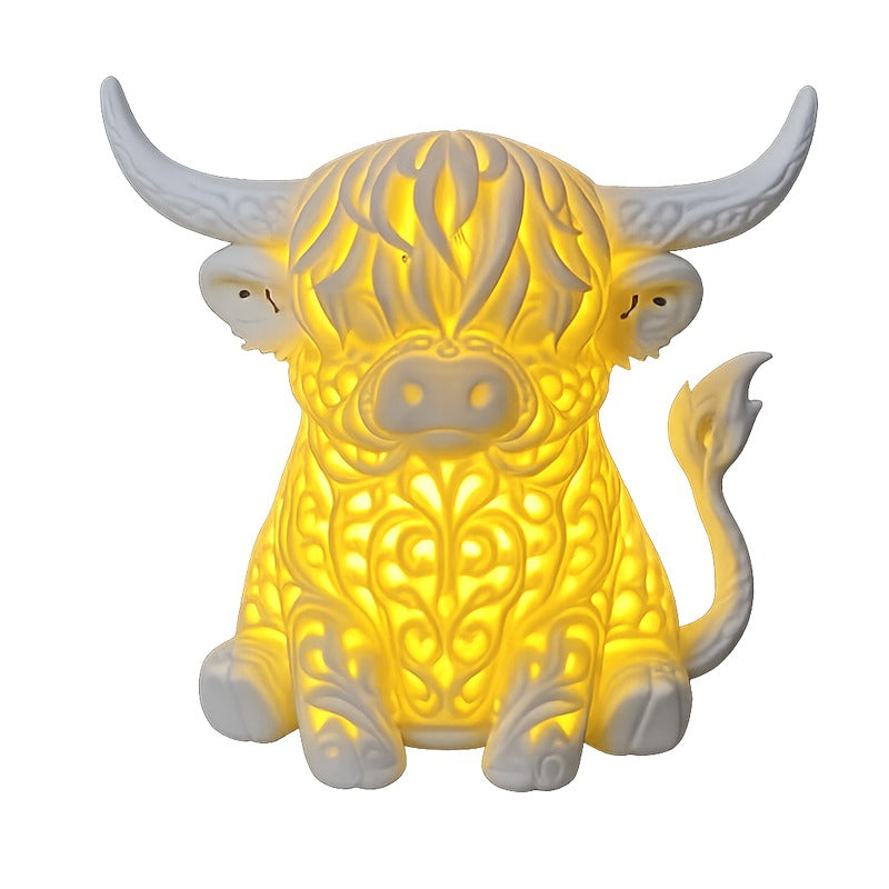 Highland cow table lamp on a white background — clean product shot