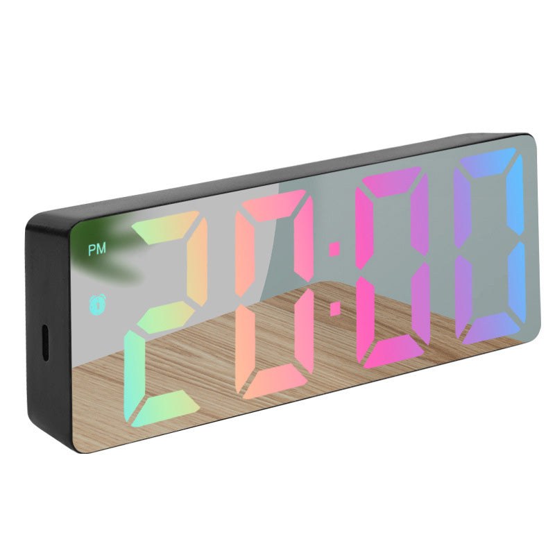 Digital alarm clock with a mirror surface and RGB LED display