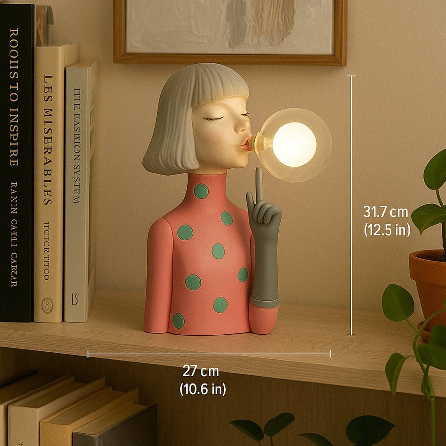 Idea figurine table lamp on a bookshelf, 12.5 in (31.7 cm) tall