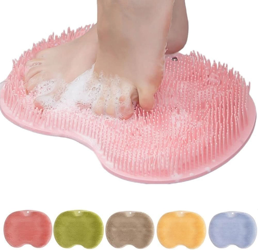 Pink silicone foot scrubber mat with suction cups