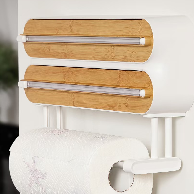 Close-up of the built-in cutter slot on the wrap dispenser