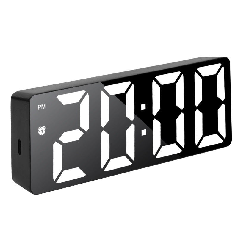 Digital alarm clock with a mirror surface and white LED display