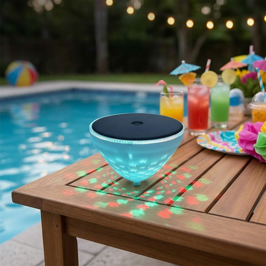 Floating pool light with fish projection at a pool party