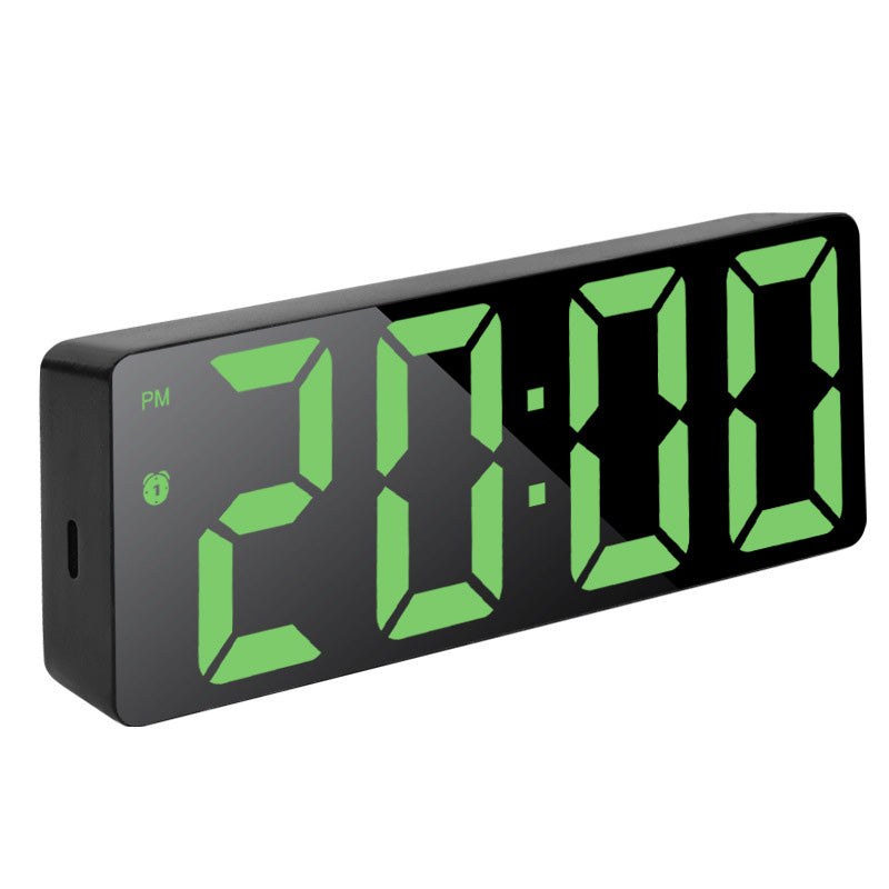 Digital alarm clock with a mirror surface and green LED display