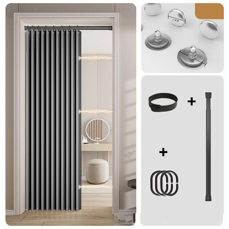 Gray accordion curtain with tension rod and magnetic hardware