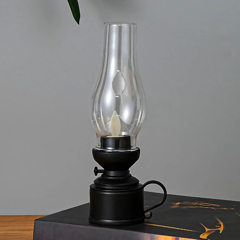 Black swing wick vintage LED oil lamp studio shot
