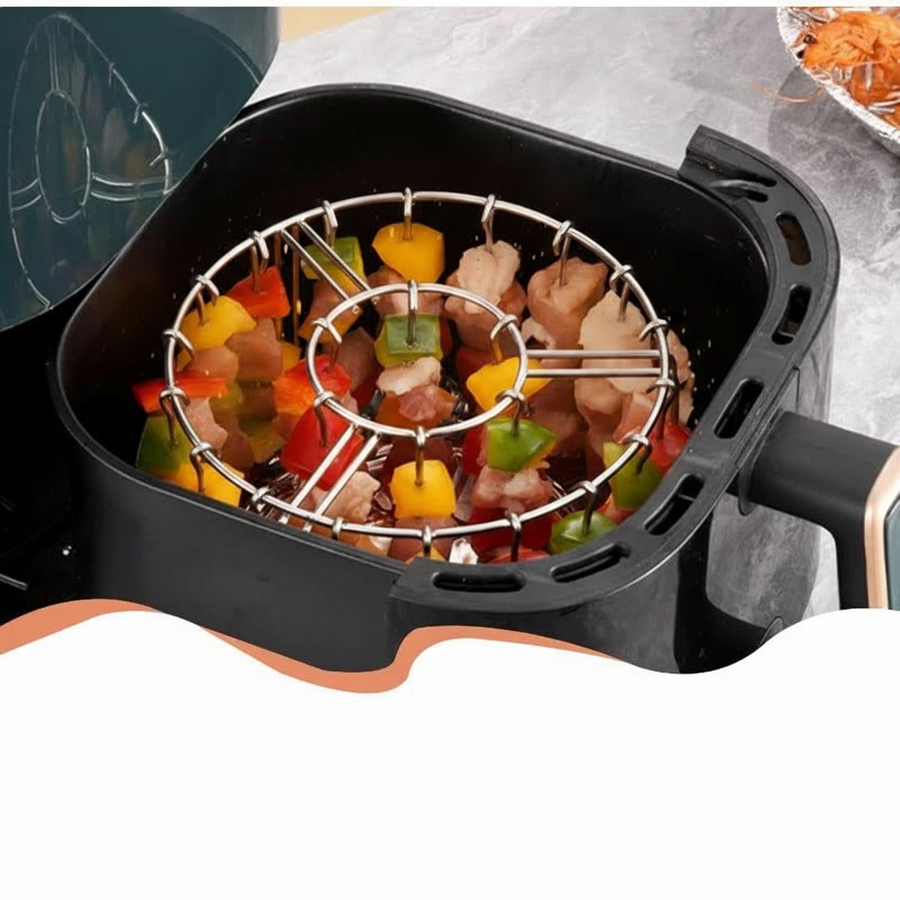 Air fryer skewer rack with skewers arranged in a triangle
