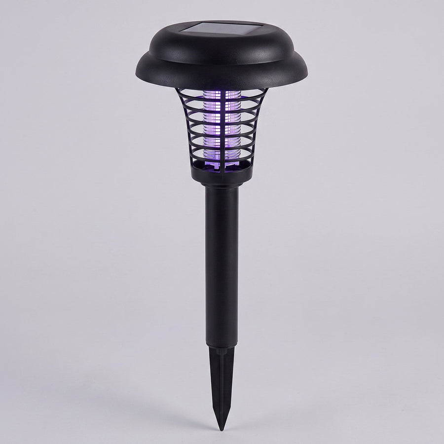 Solar-powered insect killer with UV light and ground stake – studio shot