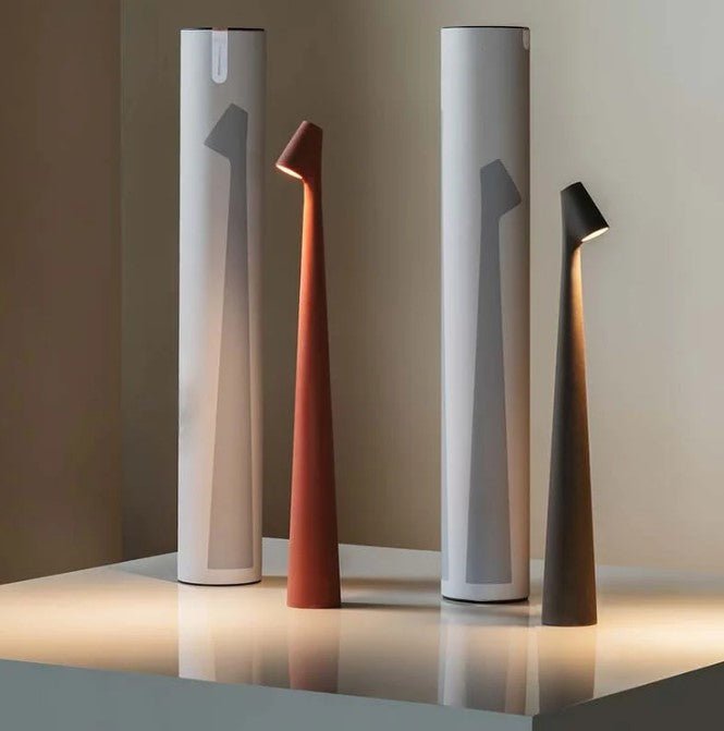 Minimalist LED table lamp in a cozy bedroom