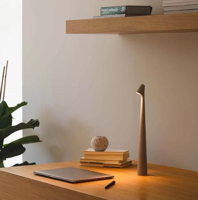 Minimalist LED table lamp in a modern interior