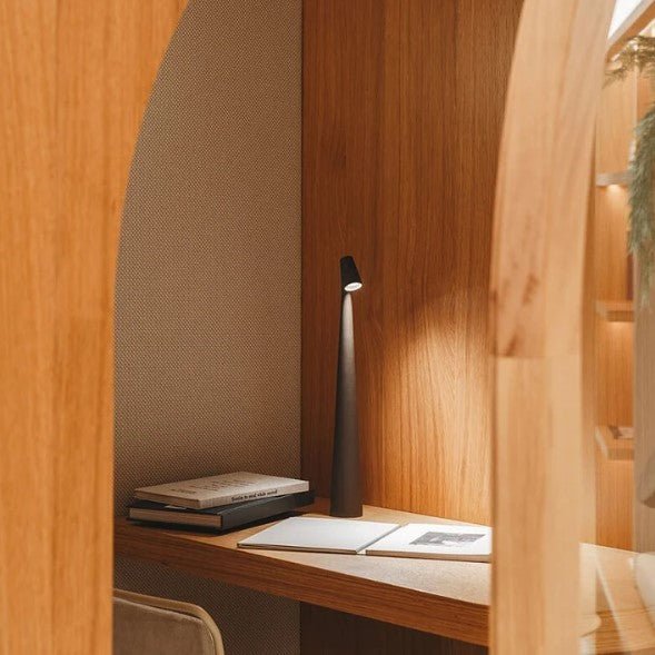 Minimalist LED table lamp shown from behind
