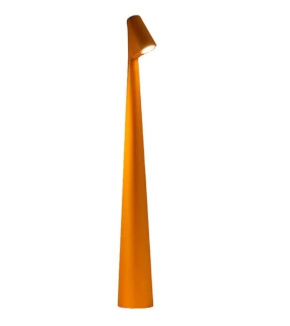 Minimalist LED table lamp on a nightstand