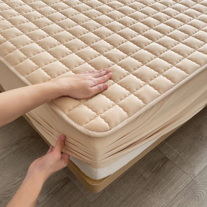 Quilted mattress cover styled in a bedroom setting