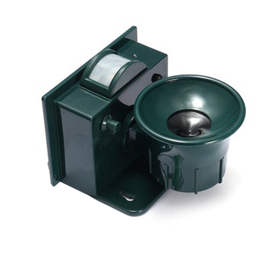 Black motion-activated bird repeller on a patio