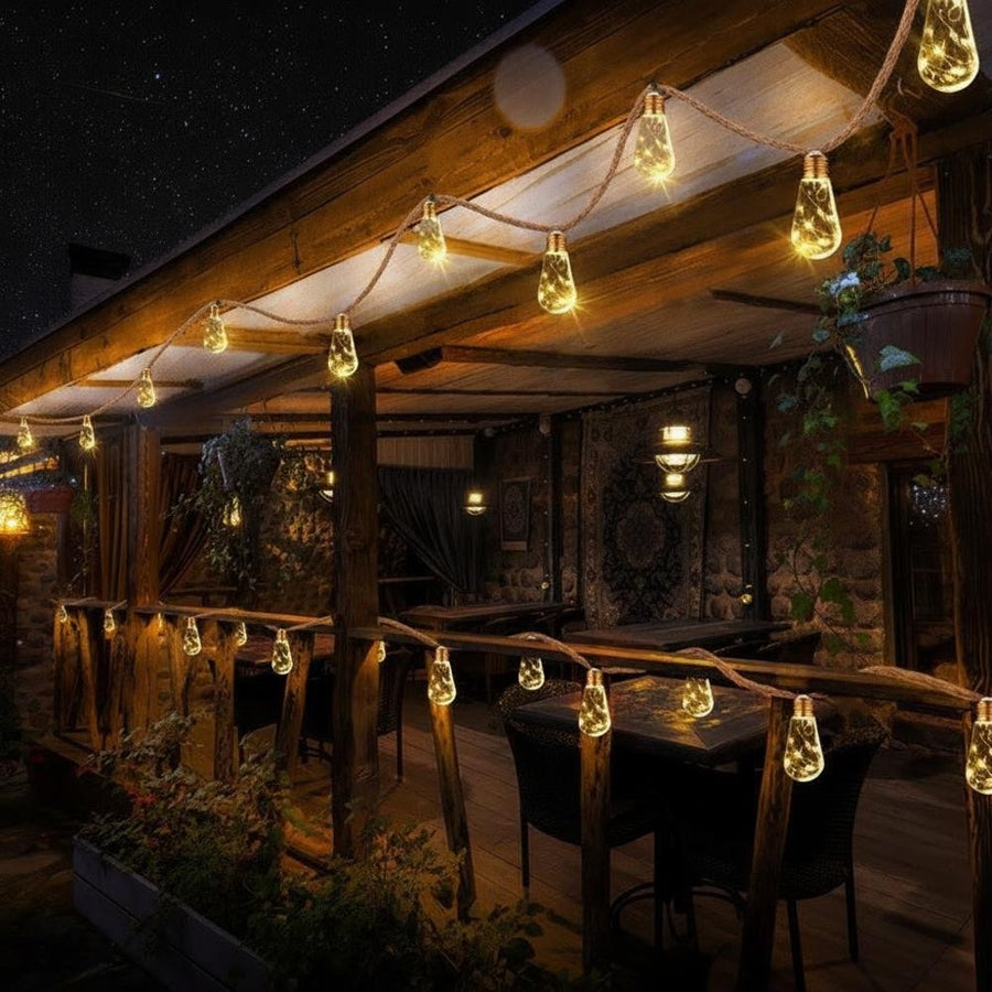 Solar hemp rope string lights on an outdoor patio at night, ambient lighting
