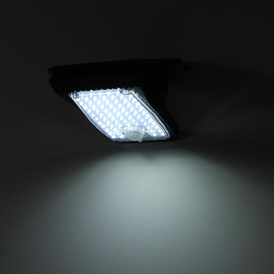 Solar light mounted and glowing cool white