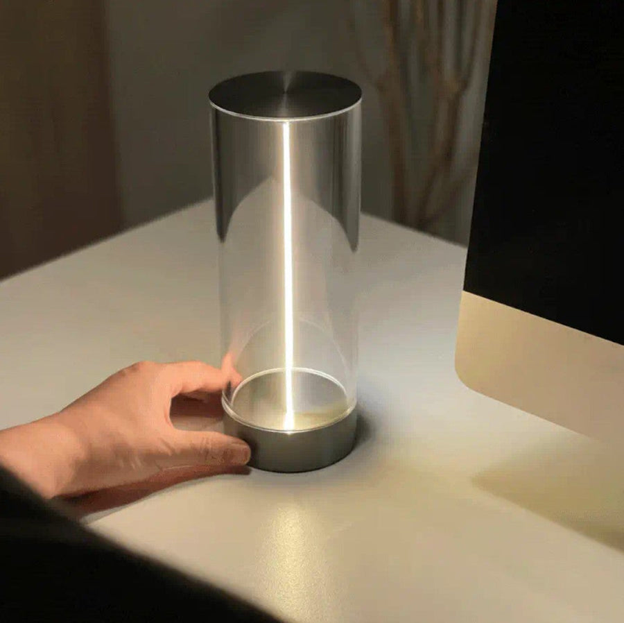 Touch dimmer control on an LED glass table lamp
