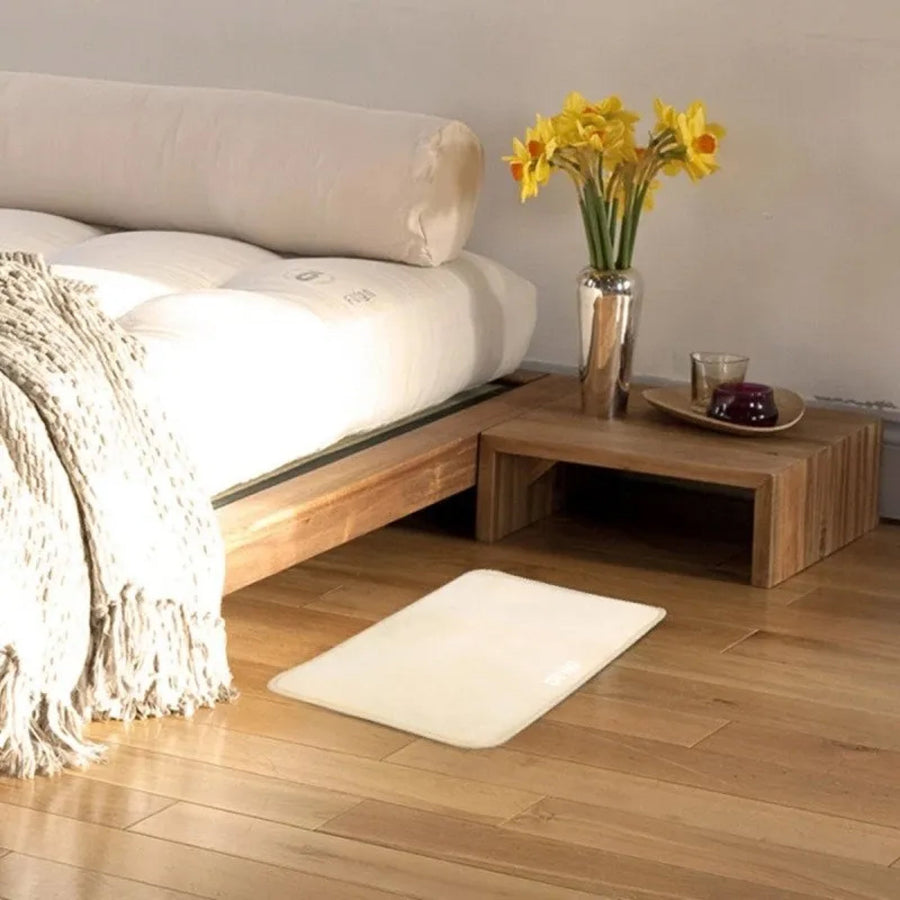 Close-up view of the step-on smart alarm clock for heavy sleepers