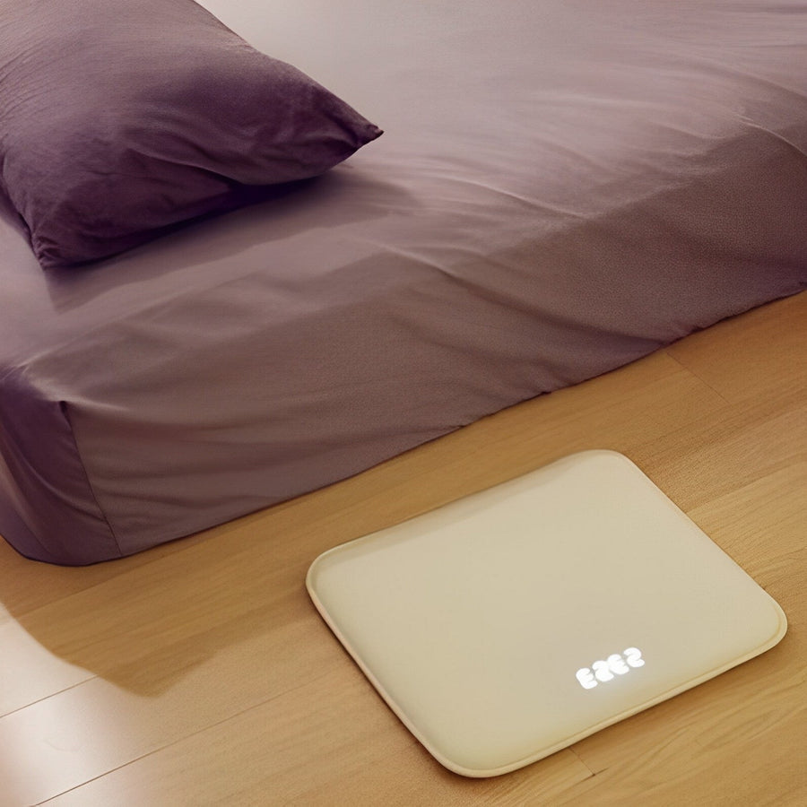 Close-up shot showing the texture of the step-on smart alarm clock